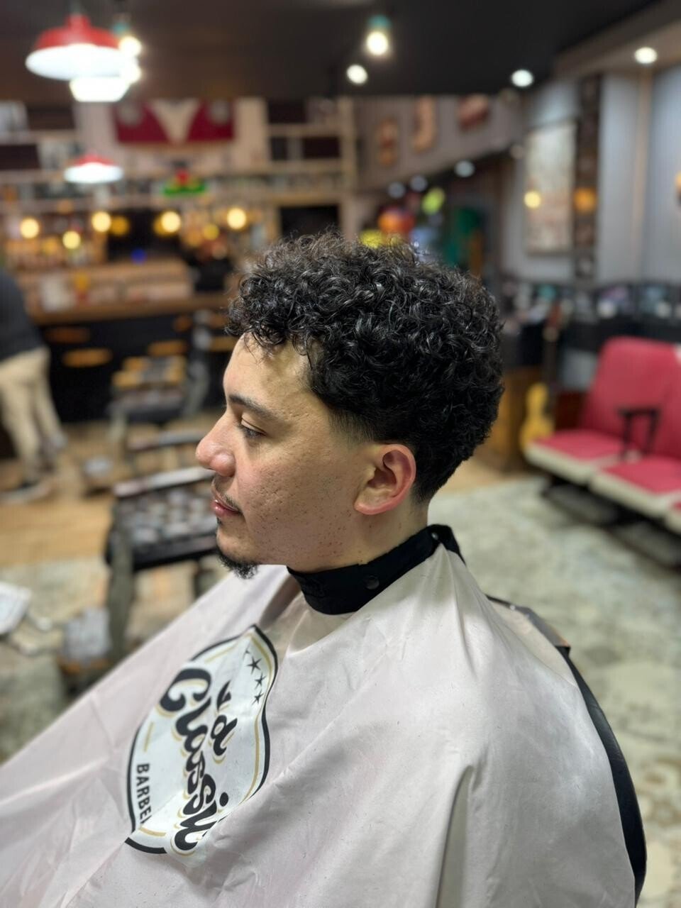Corte cacheado finalizado na Old Classic Barbearia